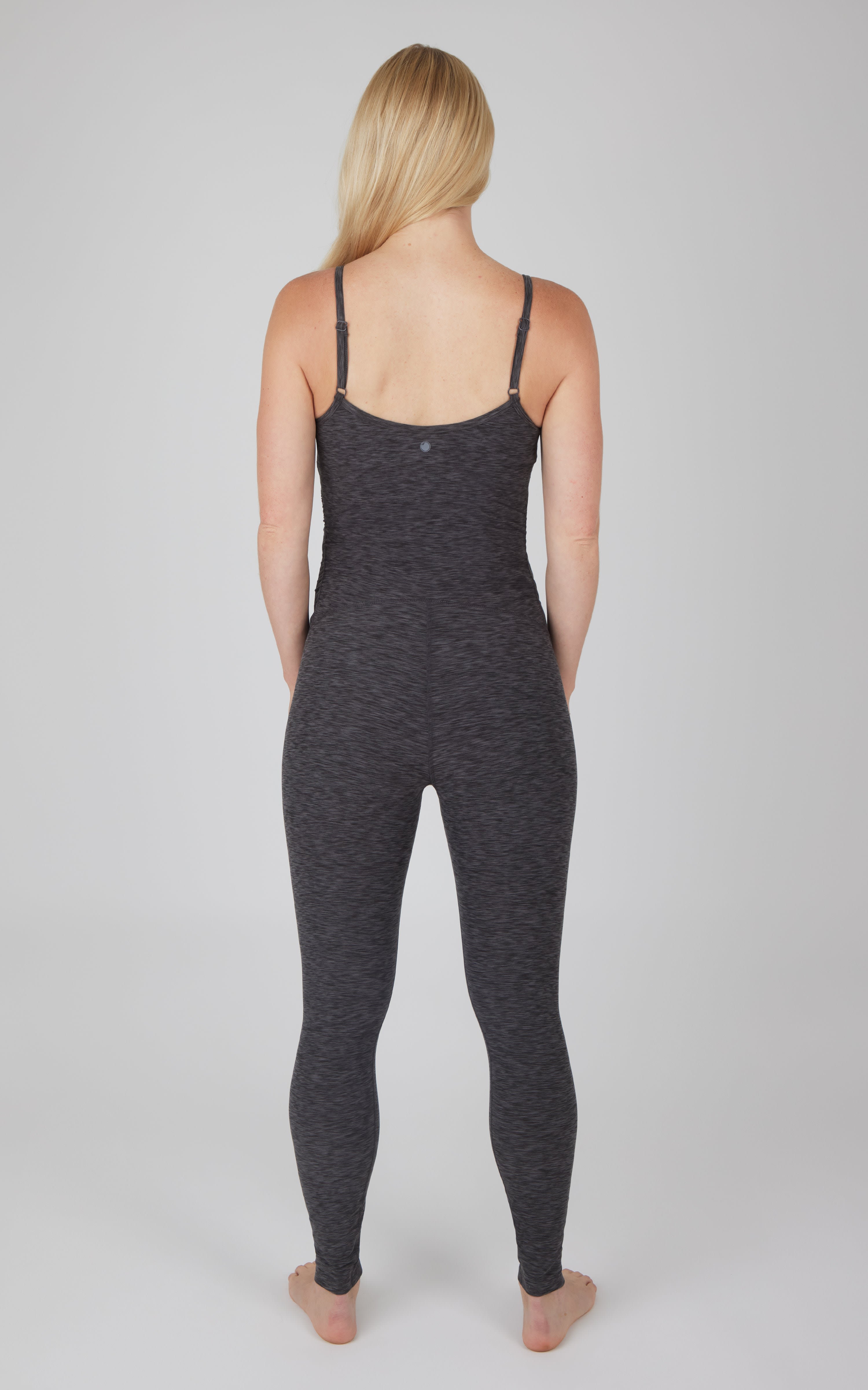 Heather asphalt maternity jumpsuit with adjustable spaghetti straps and slim fit leggings.