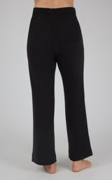 Black marled pique fabric wide leg pants with high waist and relaxed fit.