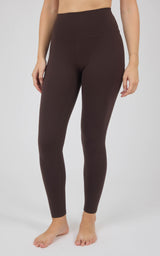Dark brown, high-rise full-length leggings with a smooth, close-fitting silhouette and ankle-length hems.