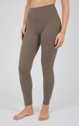 High-rise taupe full-length leggings with a smooth, stretchy finish and slim ankle cuffs.