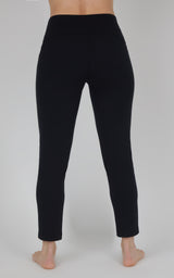 Black straight-leg pants with a smooth, fleece-like finish, cropped above the ankles and shown from behind.
