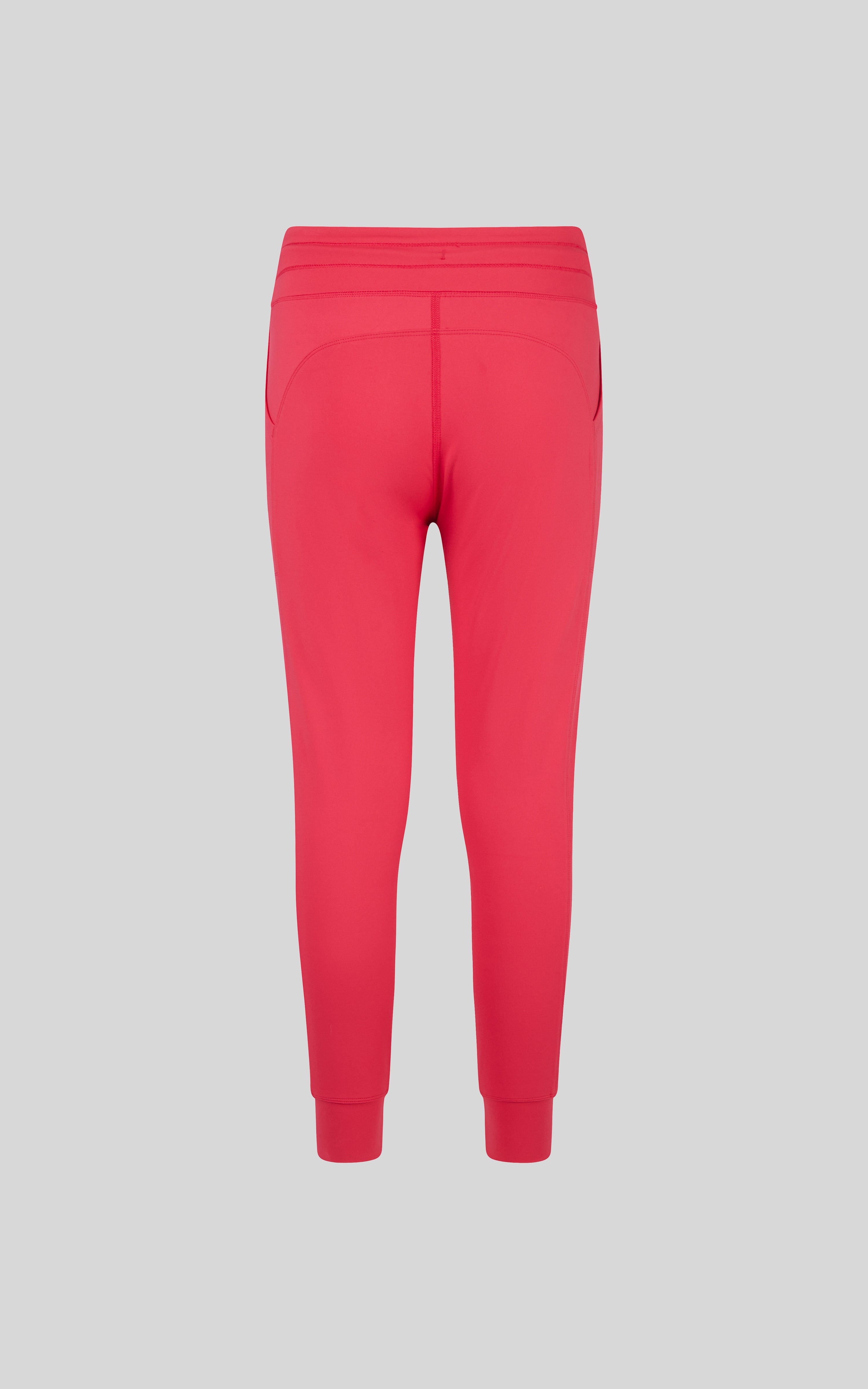 Bright rose girls' interlock cargo jogger pants with cuffed ankles and elastic waistband, back view.