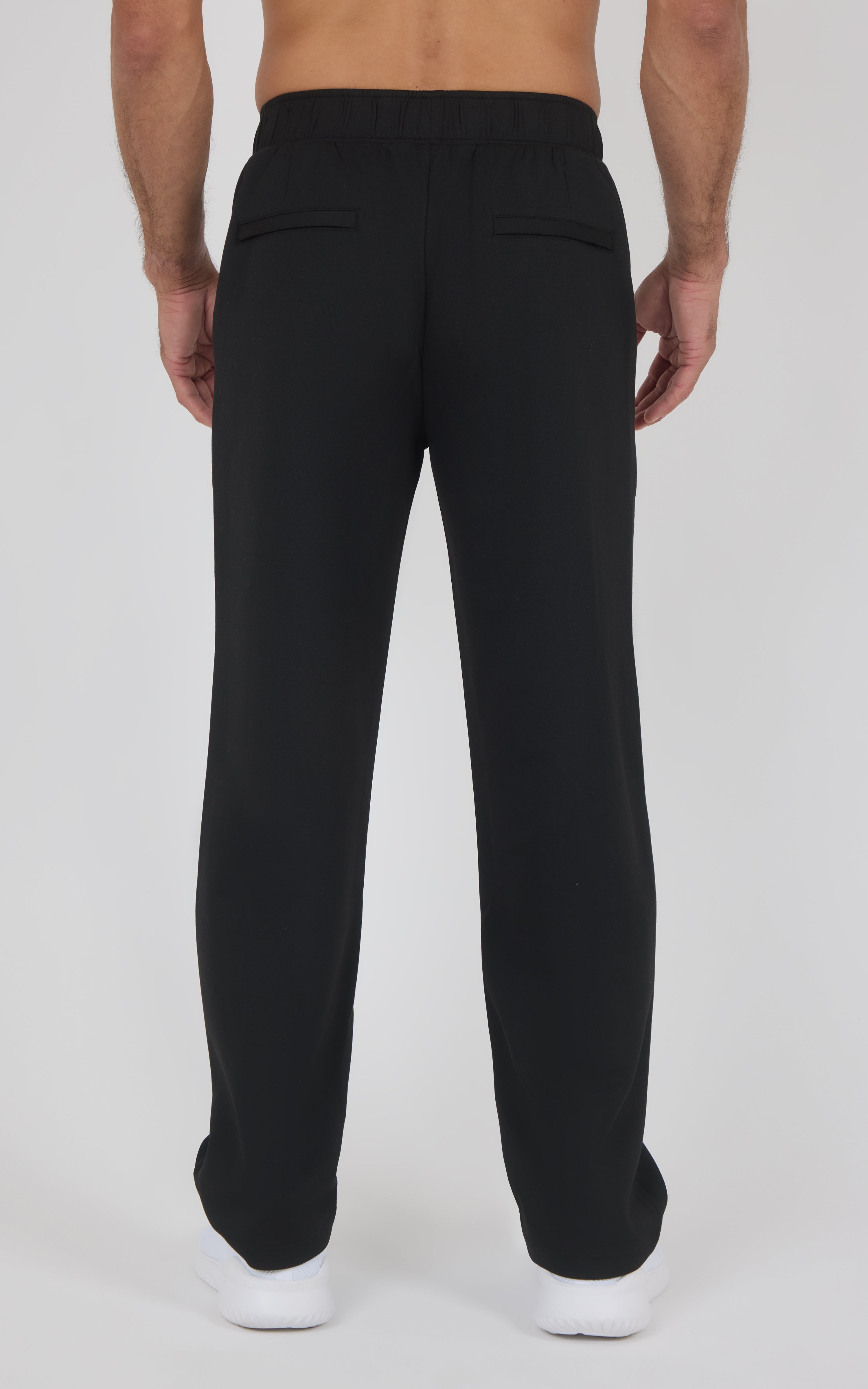 Men's black straight-leg pants with elastic waistband and back patch pockets, casual fit.