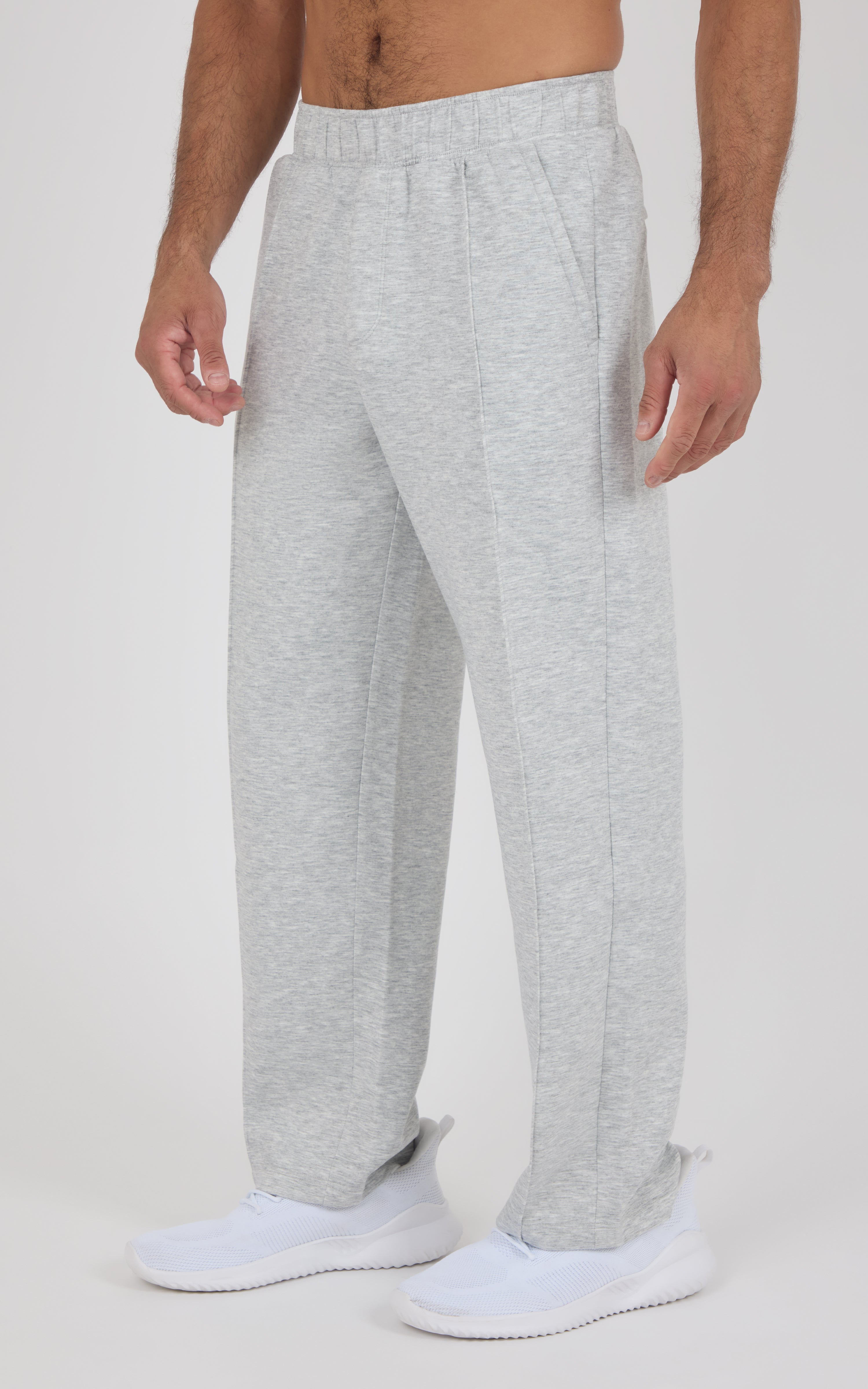 Light gray straight-leg pants with a soft, relaxed fit and elastic waistband, worn with white shoes.