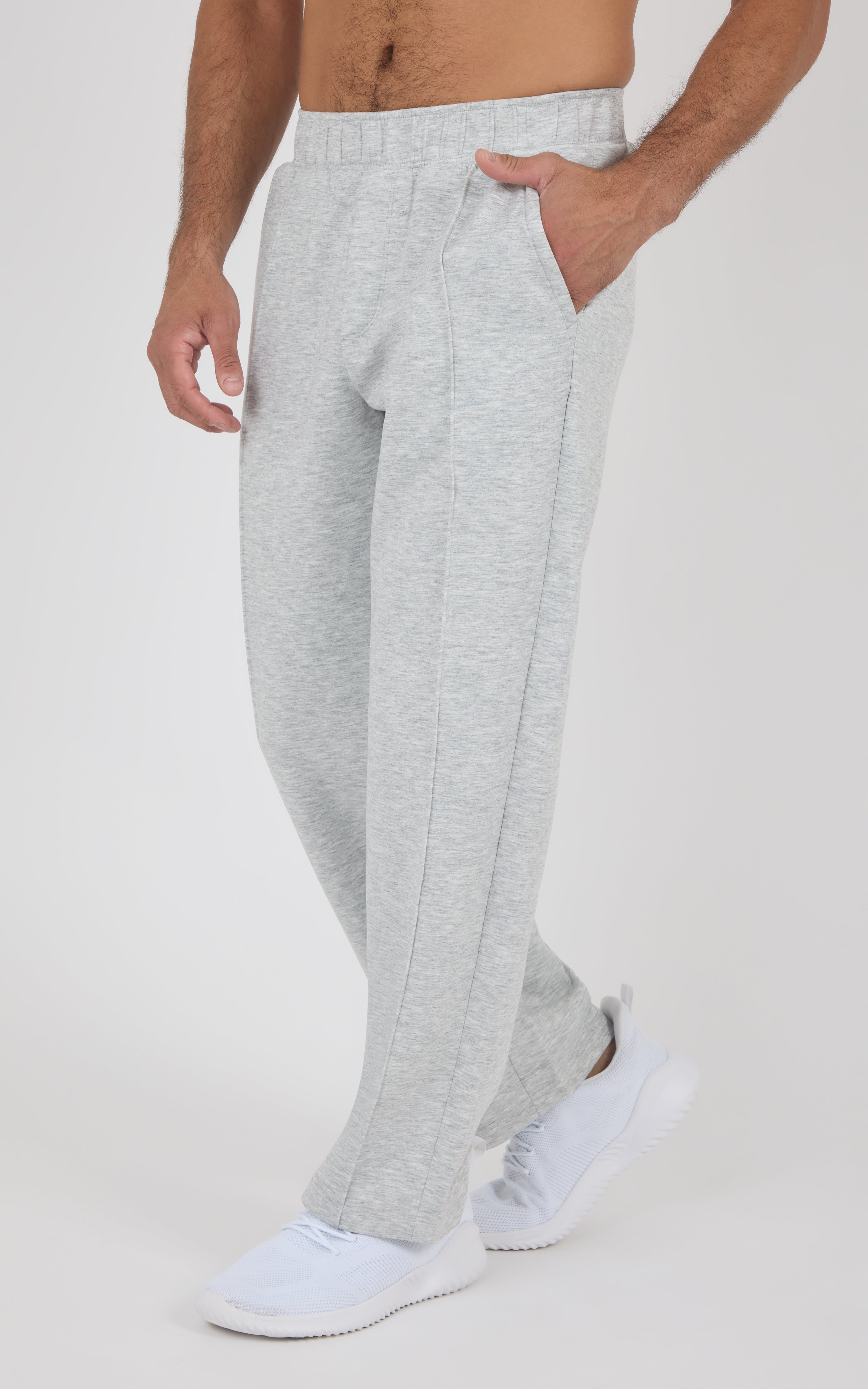 Light gray straight-leg pants with soft fabric, elastic waistband, and side pockets modeled from waist down.
