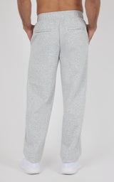 Light gray straight-leg pants with an elastic waistband and two back patch pockets, made from soft knit fabric.