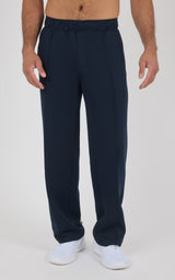 Men’s navy blue straight-leg pants with a relaxed fit, elastic waistband, and subtle side seam pockets, made from soft,.