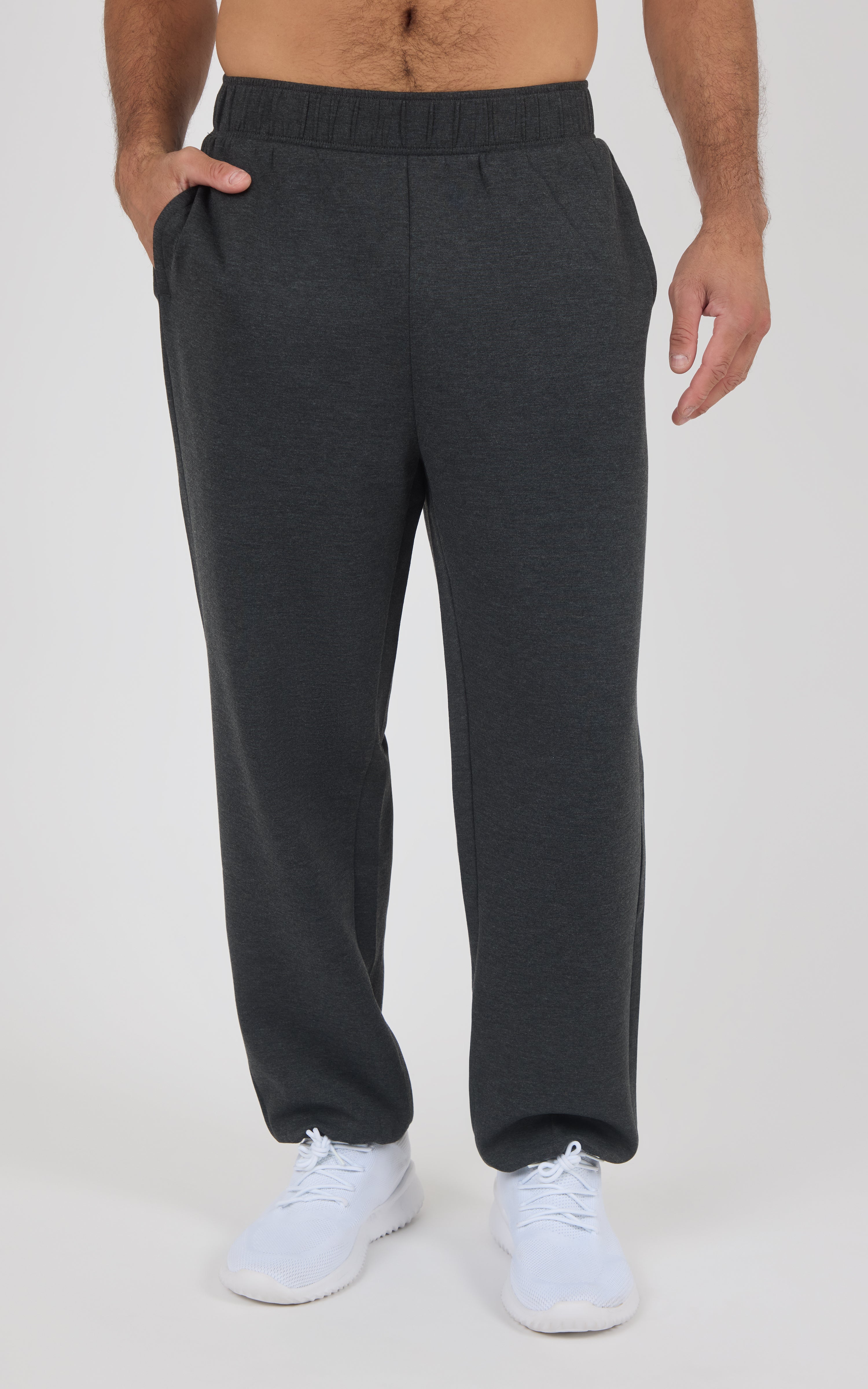Men's dark gray jogger pants with elastic waistband and side pockets, relaxed fit, soft fabric.