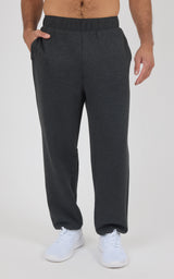Men's dark gray jogger pants with elastic waistband and side pockets, relaxed fit, soft fabric.