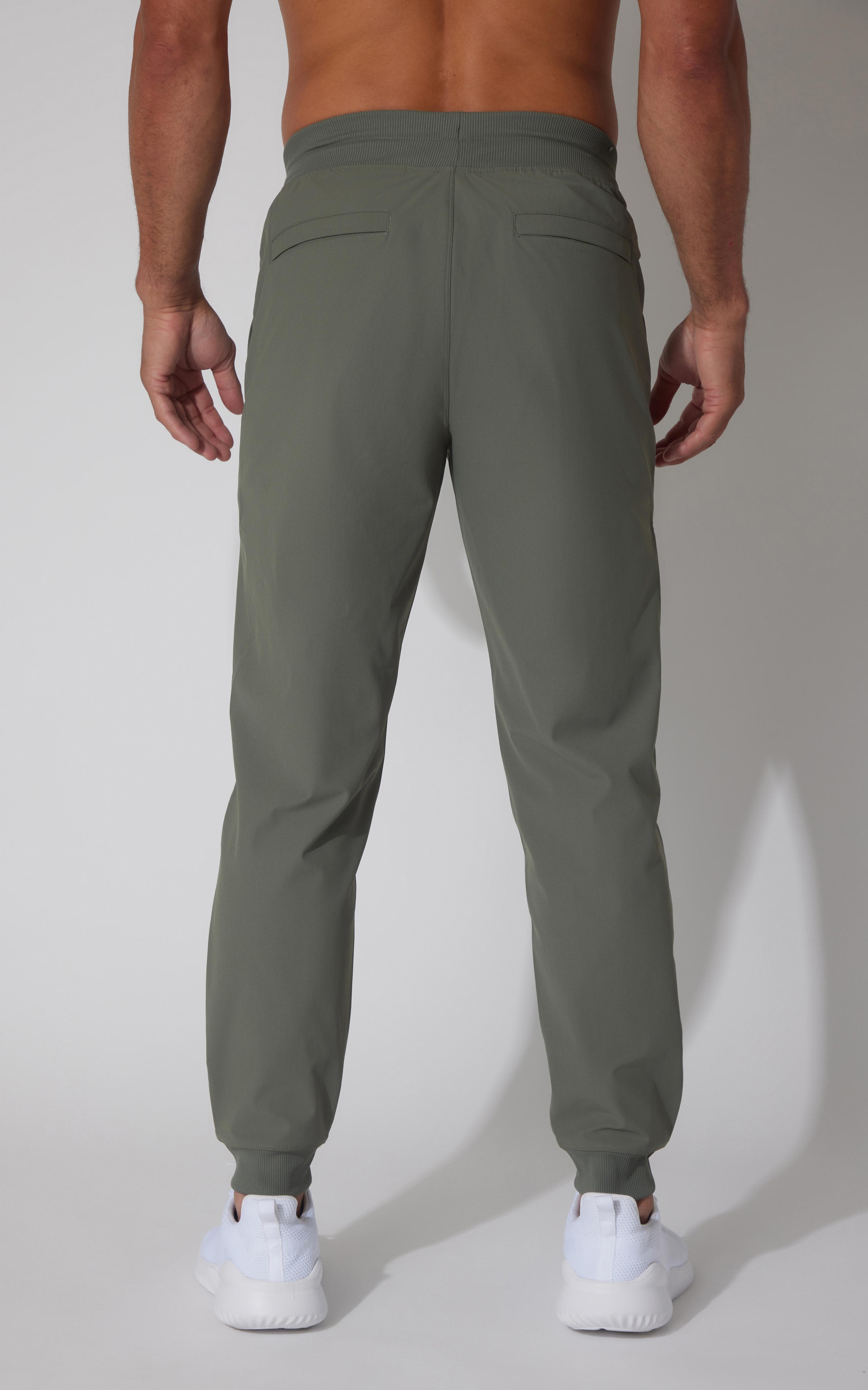 Men's joggers in mountain sage with elastic waistband and cuffs, rear seam detail.