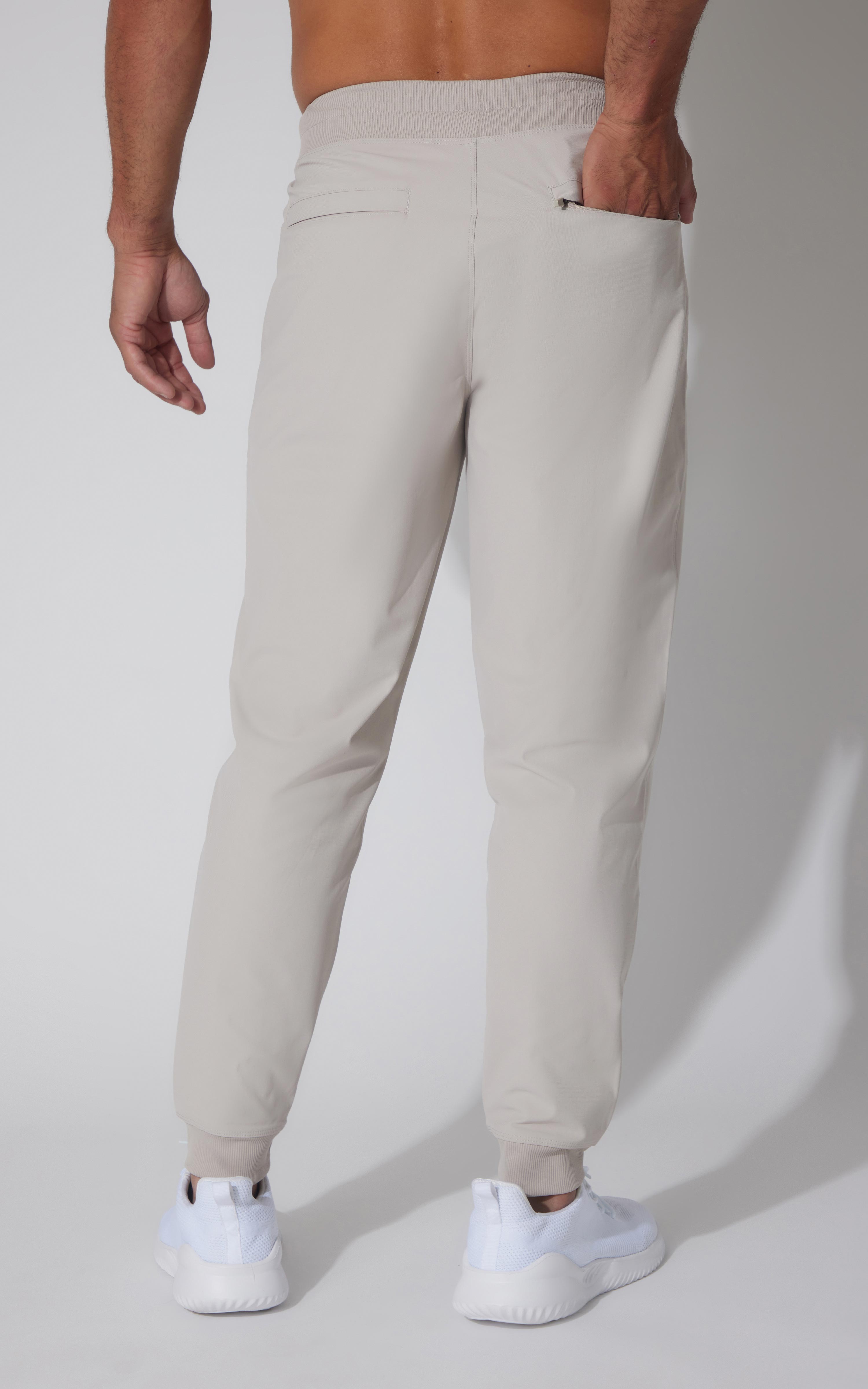 Men's joggers in light gray Mountain Sage with elastic cuff and back pocket detail.