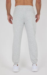Light gray Softlite joggers with a tapered fit, elastic cuffs, and a back waistband, shown from behind.