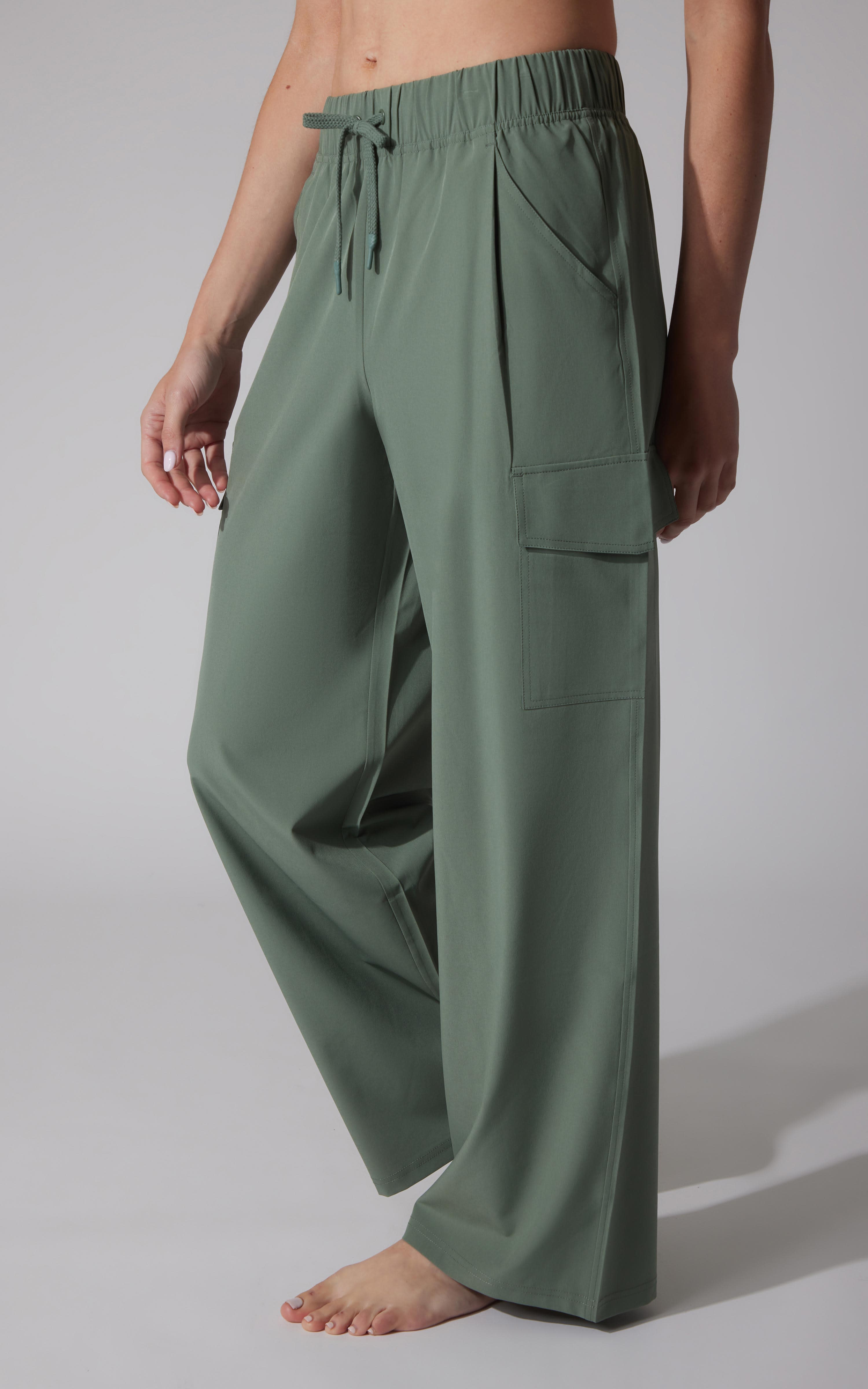 Earthy olive wide leg cargo pants with drawstring waist and large side pockets.