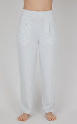 Light grey straight-leg lounge pants with pintuck details and front pockets, soft fabric.