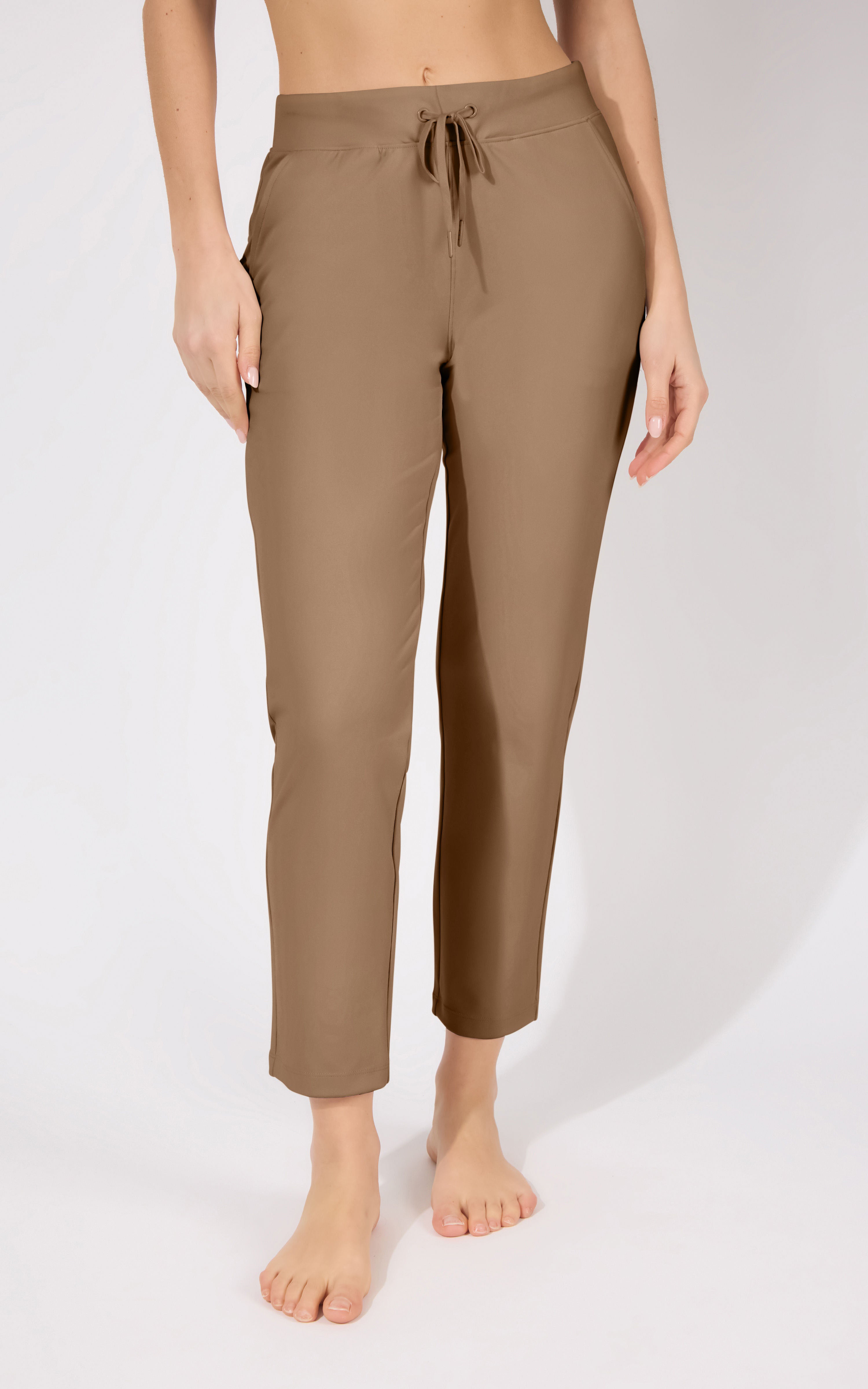 Straight leg pants in warm chocolate brown with a drawstring waist and cropped hem.