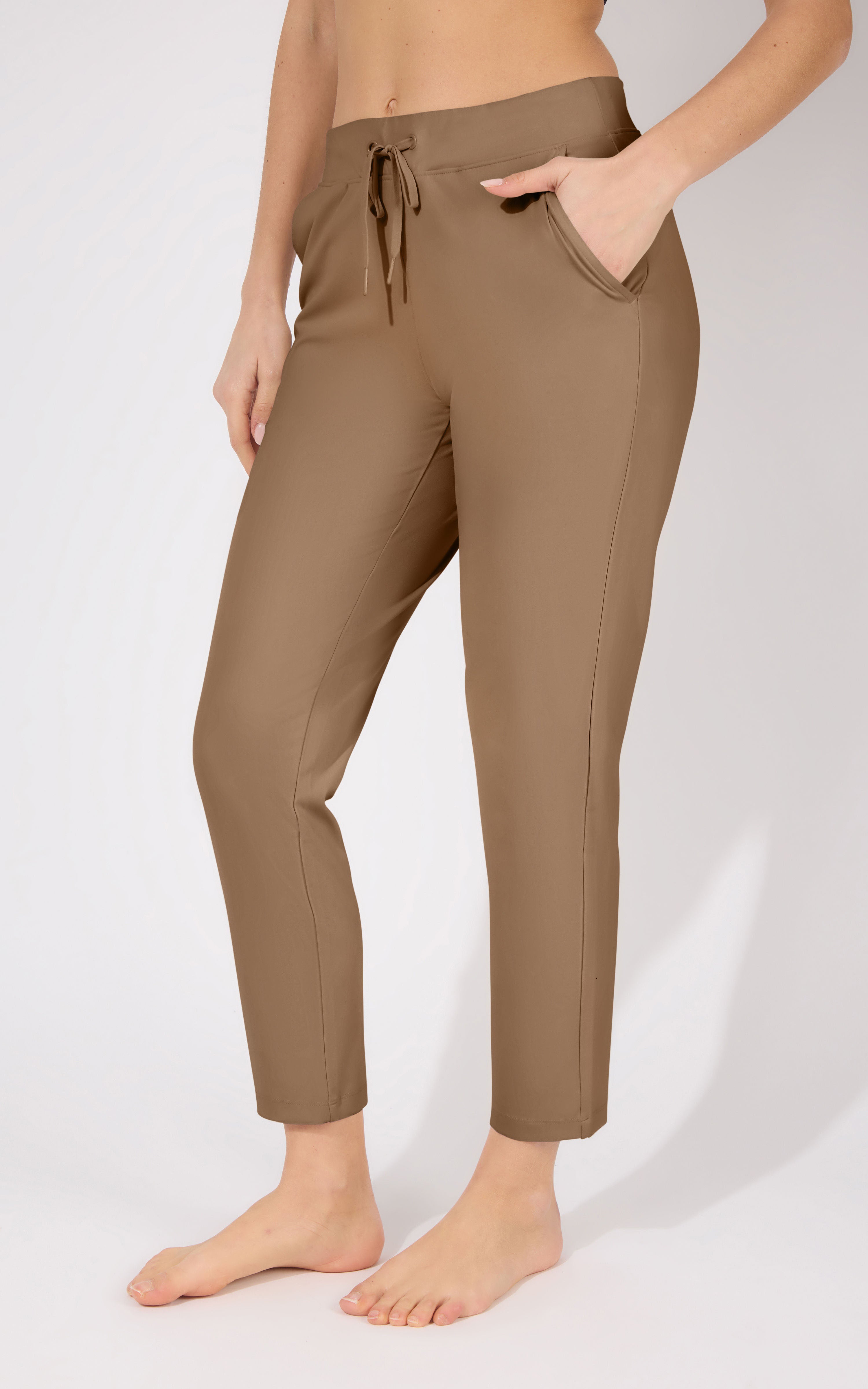 Straight leg chocolate brown pants with drawstring waist and side pockets.