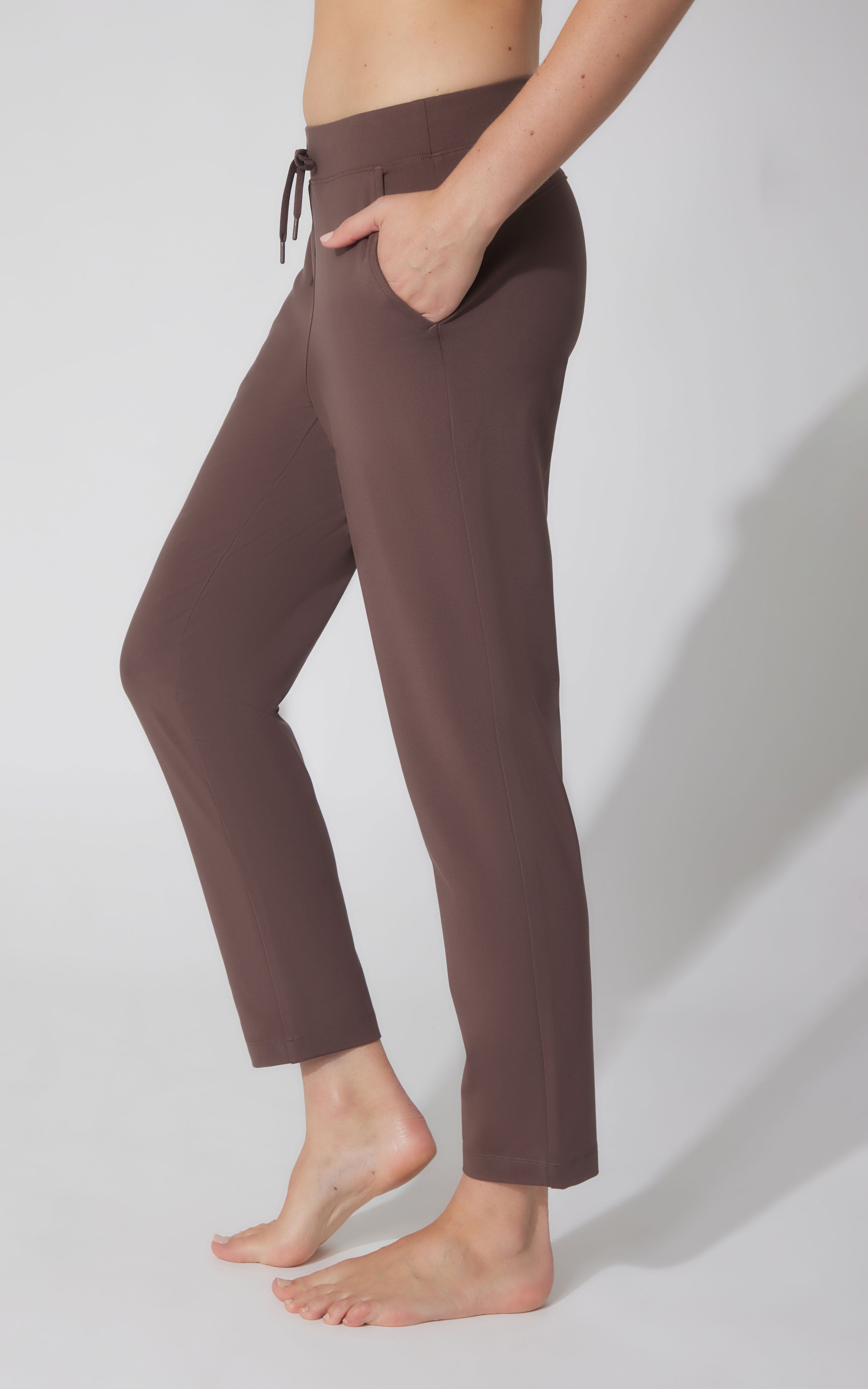 Chocolate brown straight leg pants with side pockets and drawstring waist.