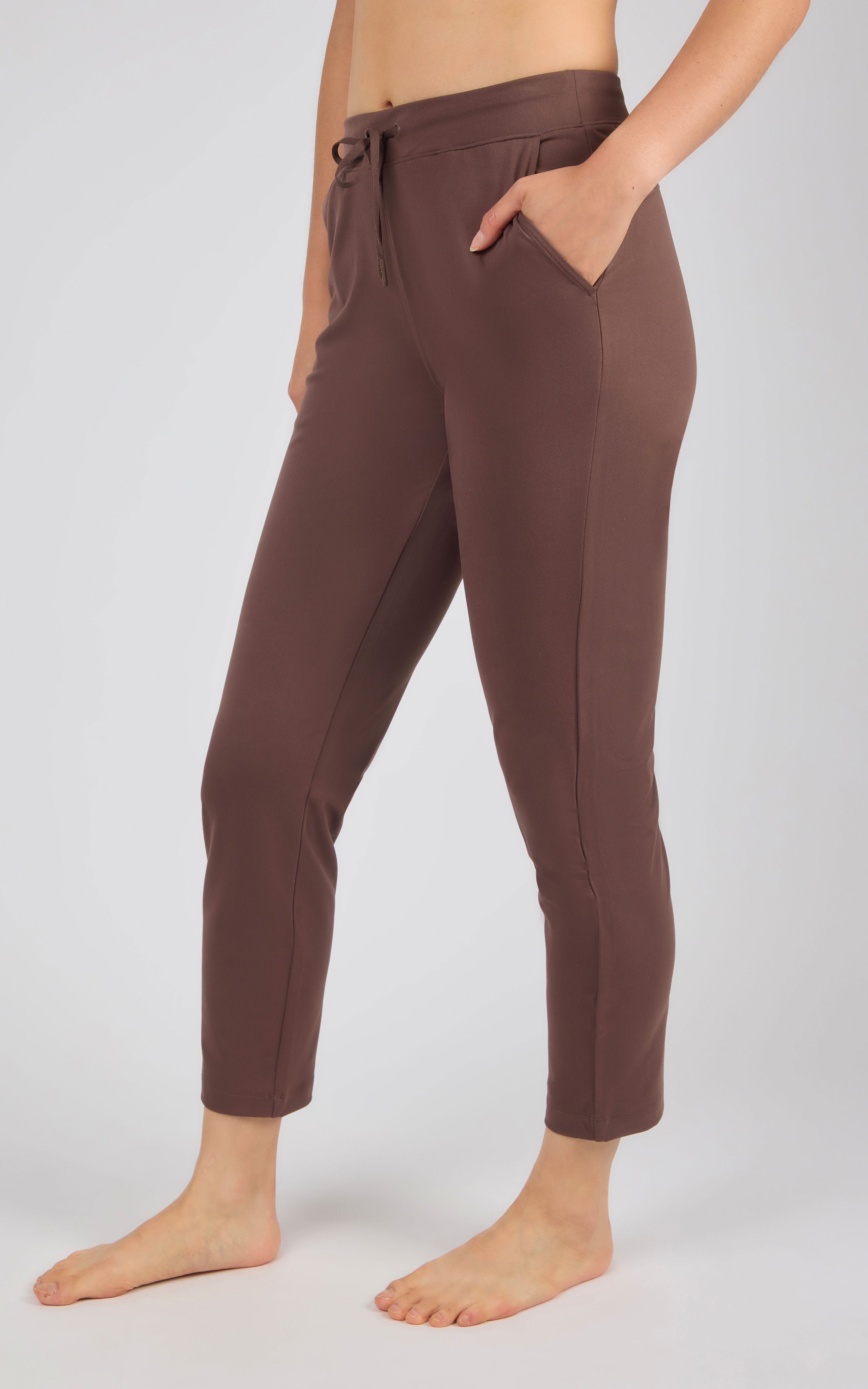 Straight leg pants in rich chocolate brown with a drawstring waist and side pockets.