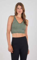 Seamless ribbed tank bra in stone wash green with wide straps and deep V-neck.