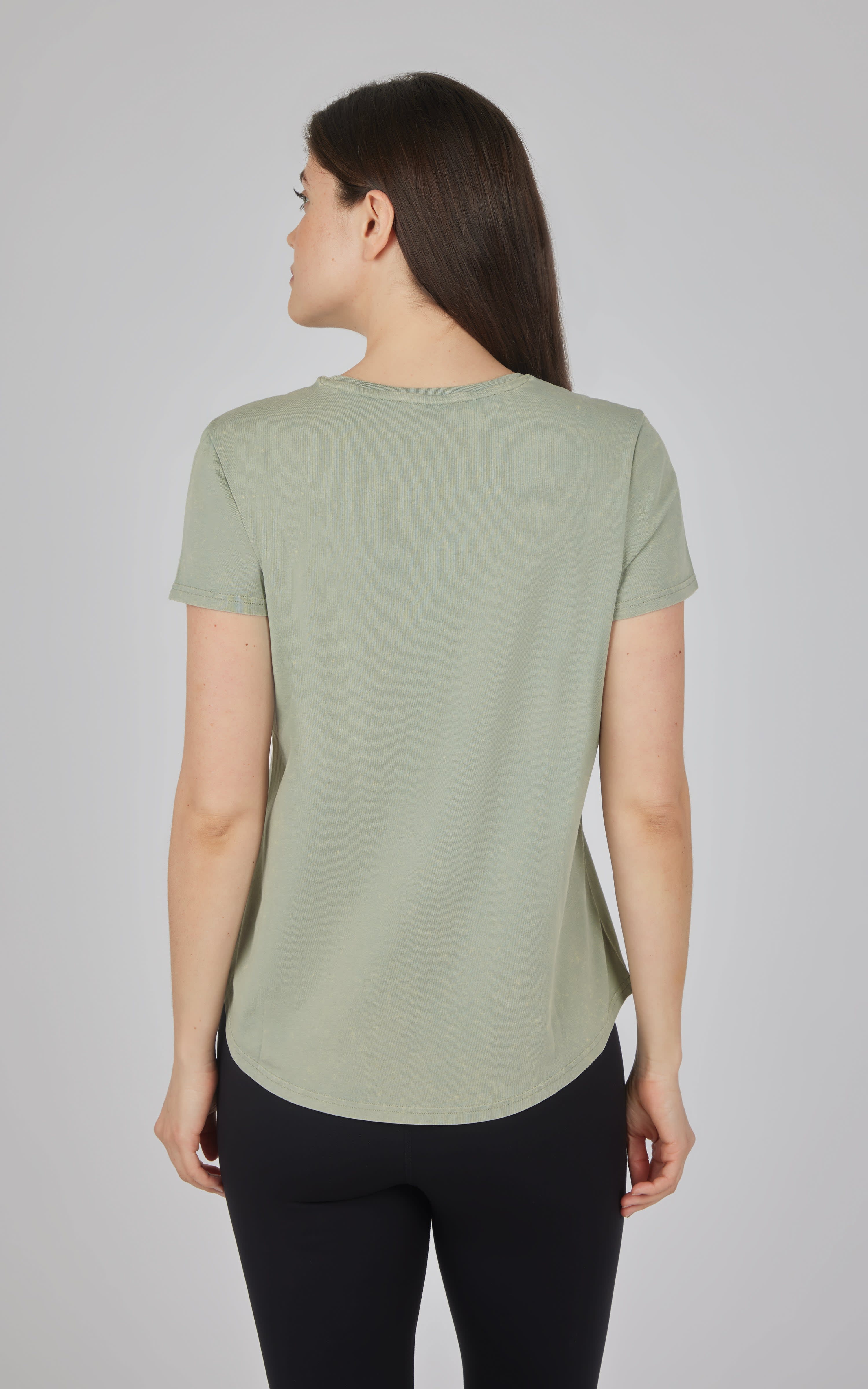 Women's light green acid wash cotton jersey crew neck tee with short sleeves, back view.