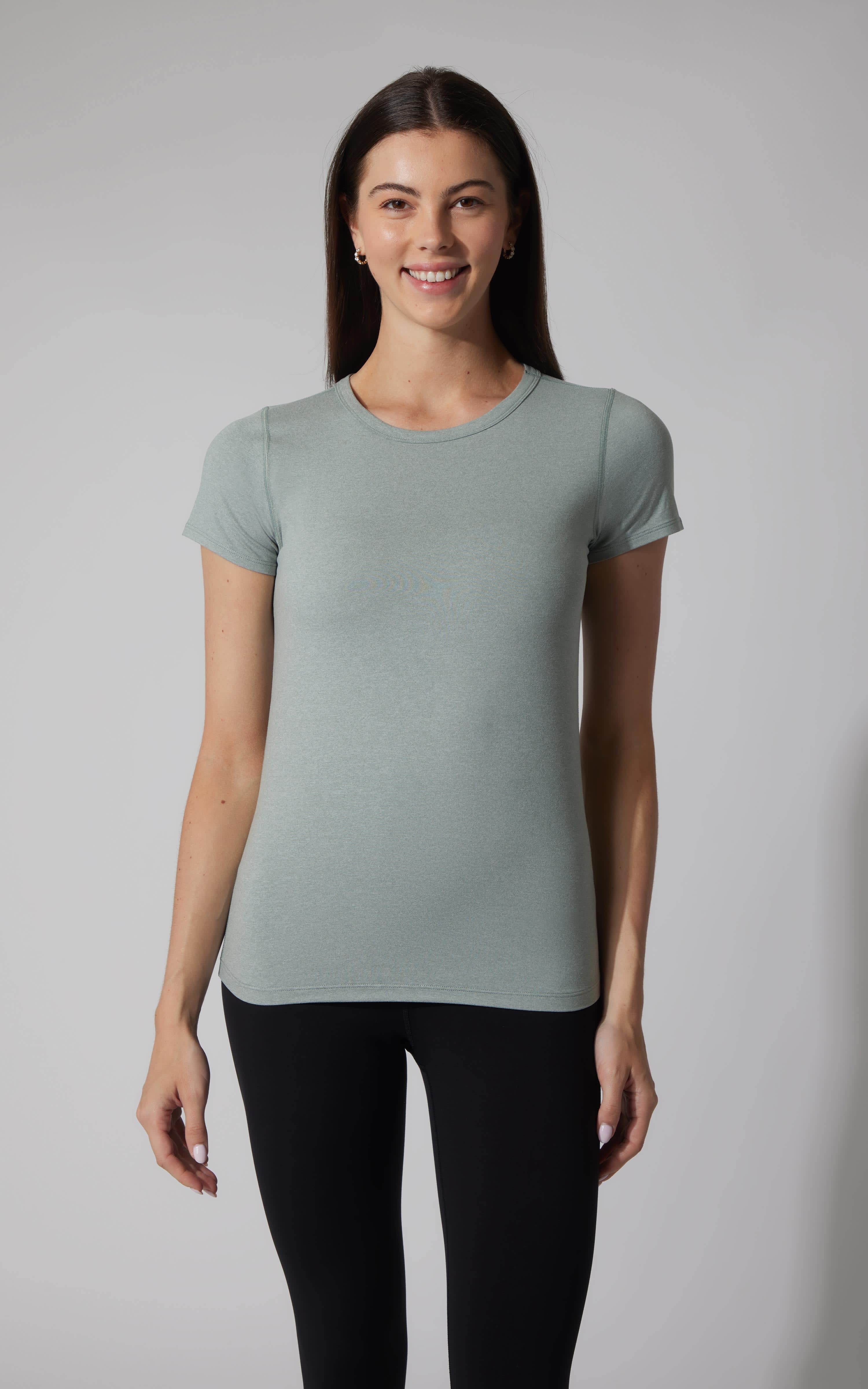 Heather thunder storm crew neck short sleeve tee with fitted silhouette on model.
