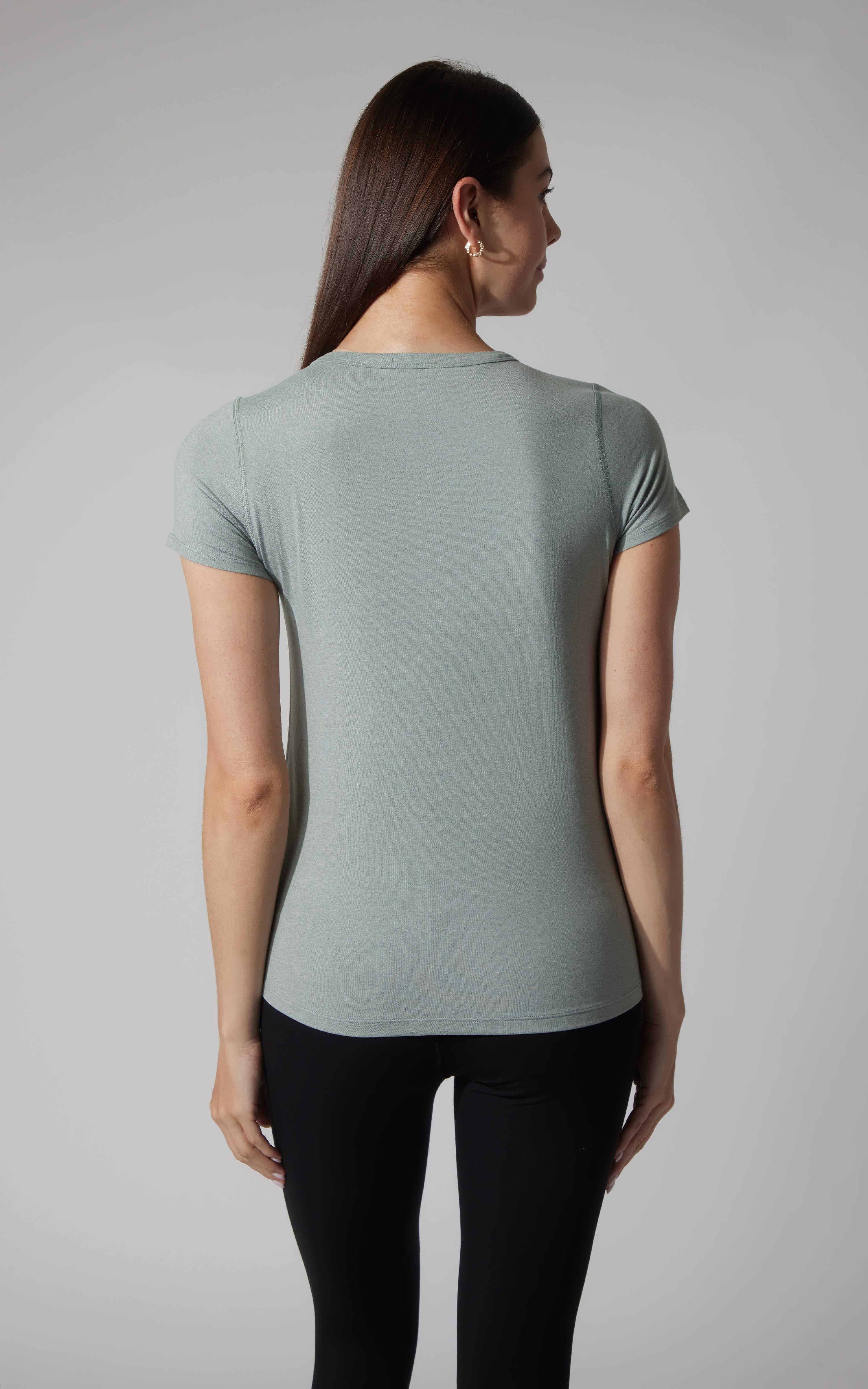 Heather clover cationic jersey crew neck short sleeve tee, back view on model.