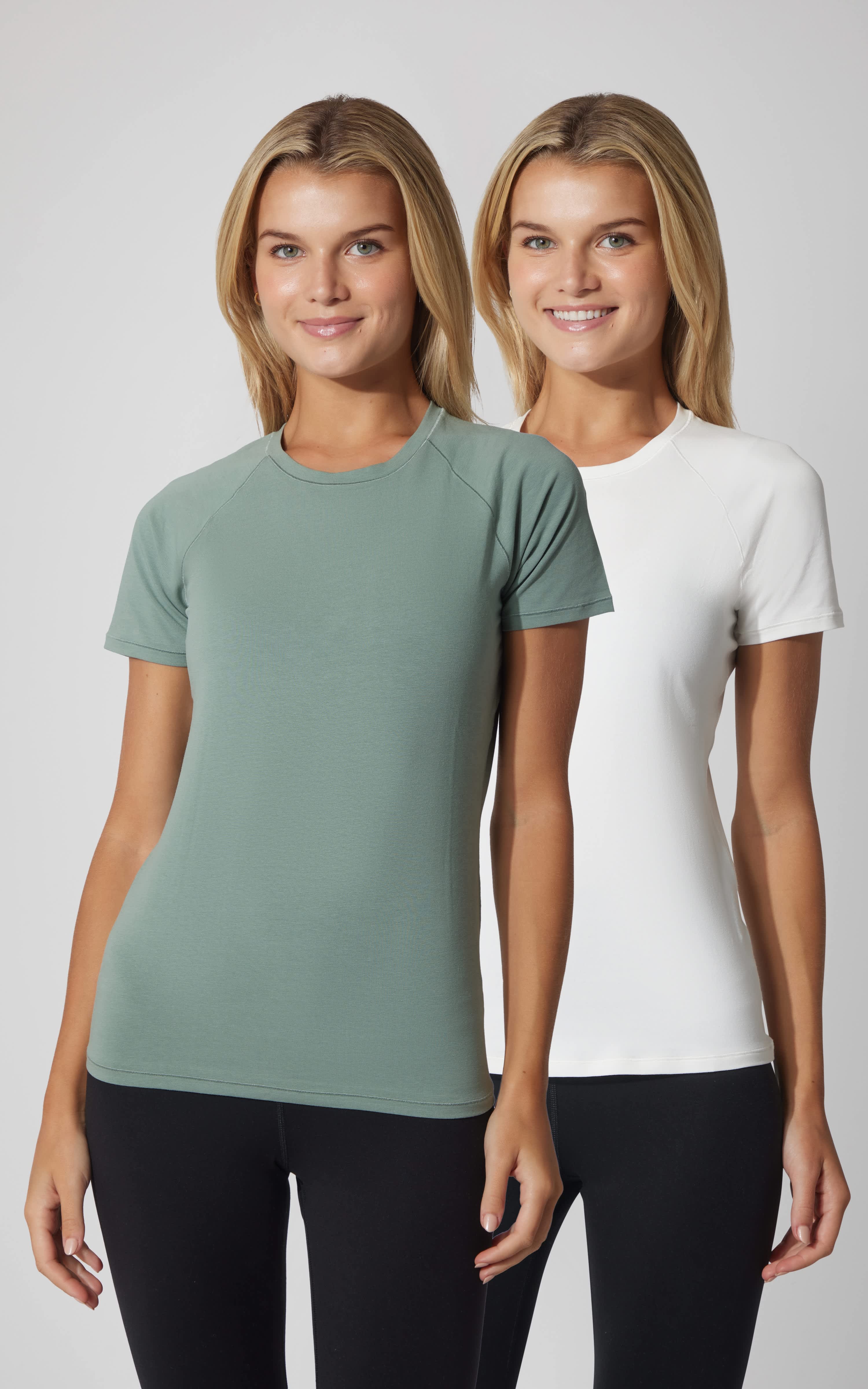 Two women's crew neck short sleeve tops in muted green and white, fitted style.