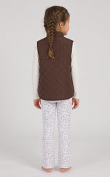 Back view of a toddler wearing a brown quilted vest over a light long-sleeve top and pale patterned flare pants.