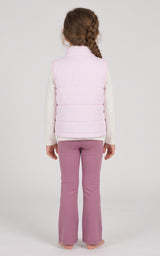 Toddler girl wears a pale pink quilted vest over a long-sleeve top with matching mauve flare pants.