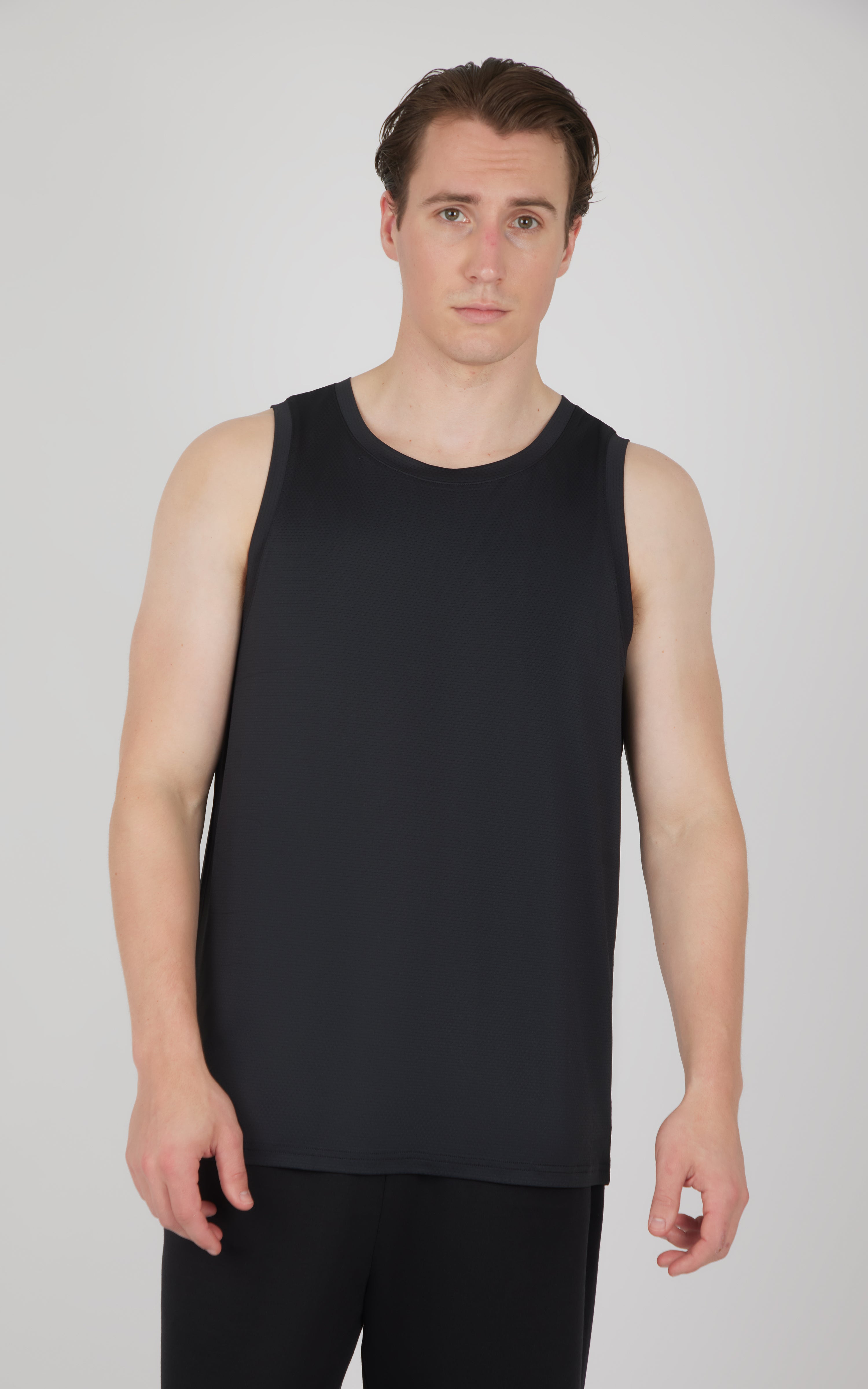 Black men's muscle tank with wide shoulder straps and a relaxed fit.
