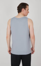 Men’s sleeveless race muscle tank in light gray with a relaxed fit and scoop neck seen from back.