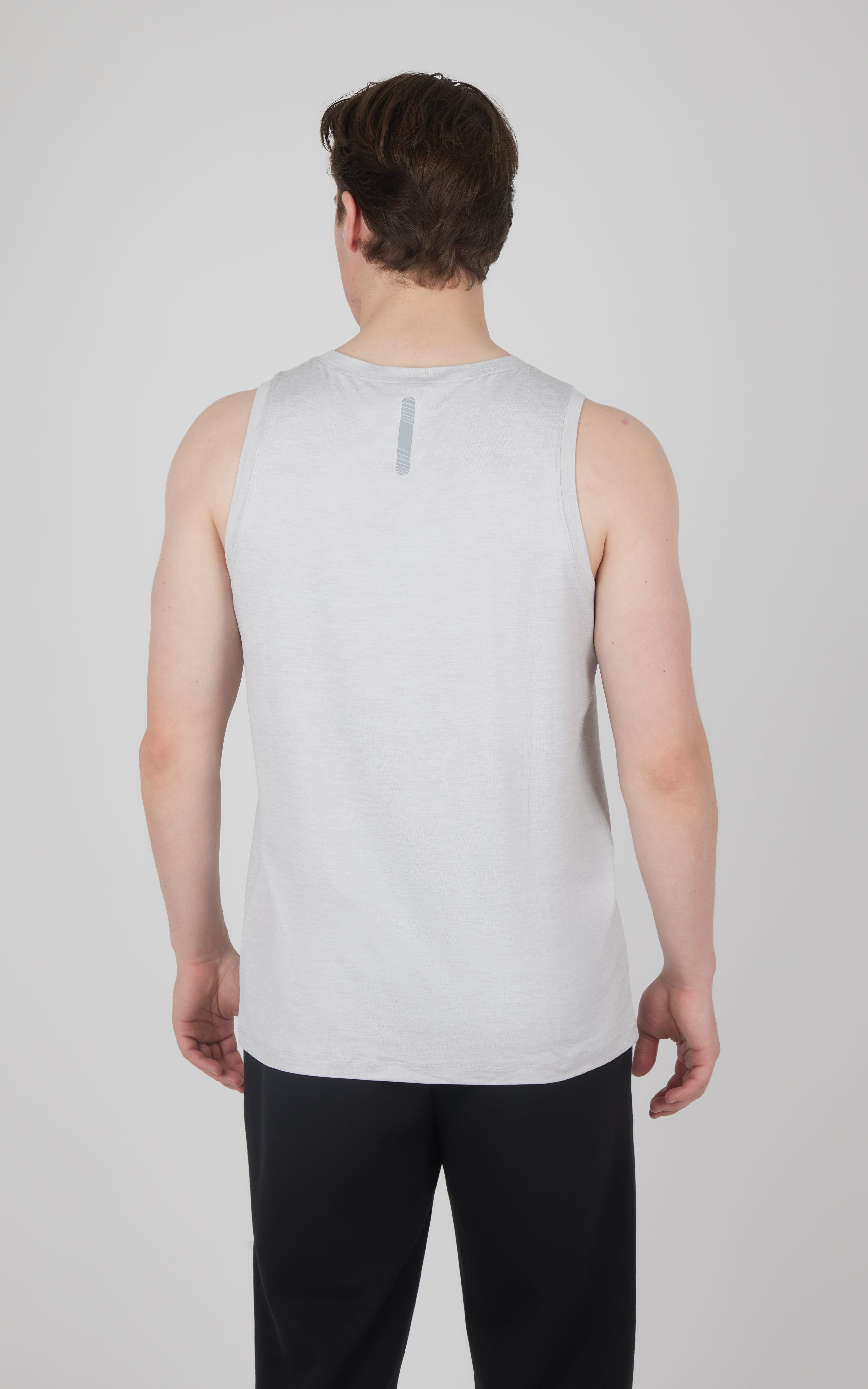 Men's light gray heather muscle tank with sleeveless cut and small vertical reflective detail on upper back.