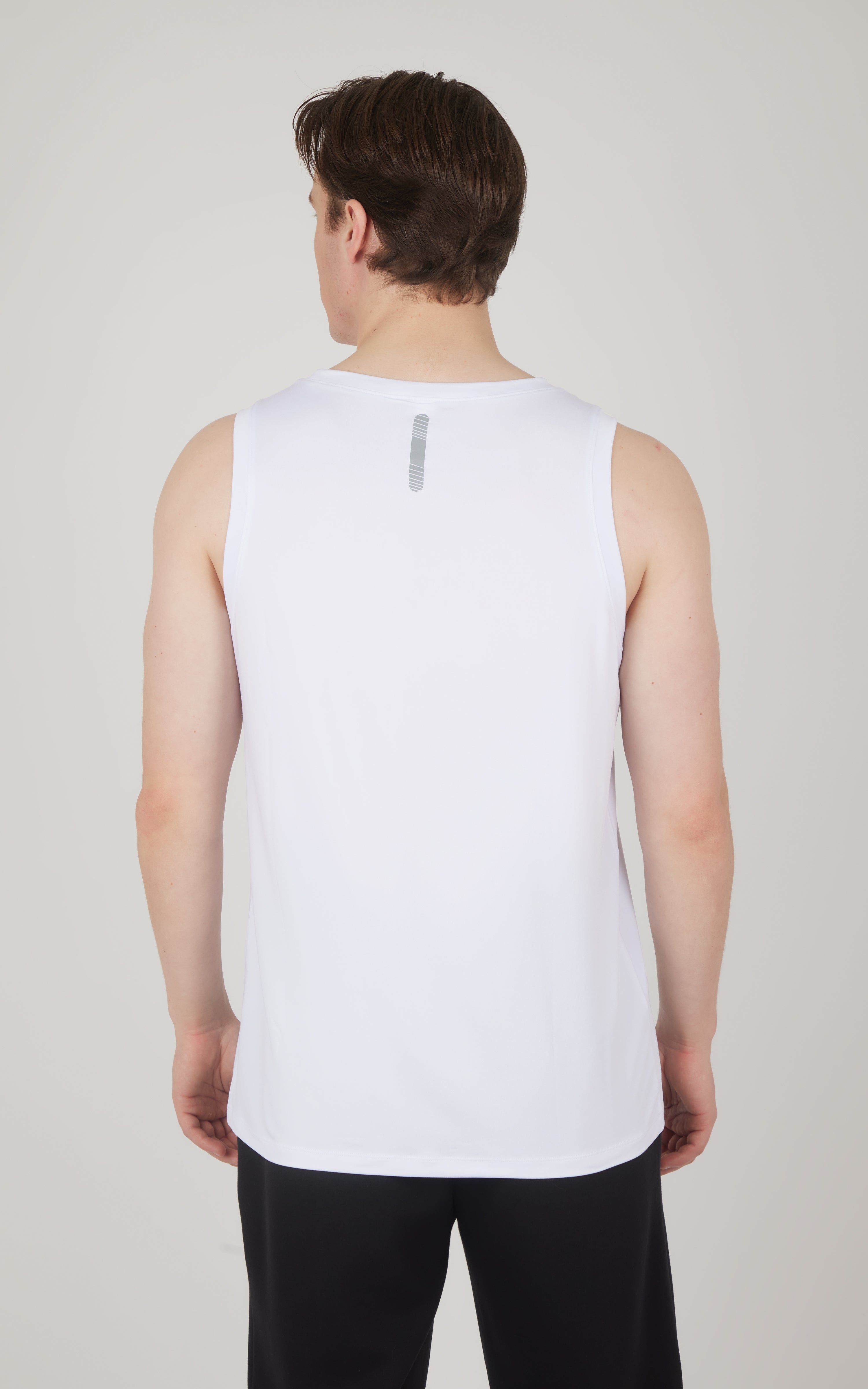 Men's white sleeveless muscle tank with a slim fit and small reflective logo on upper back.