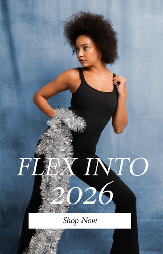 A girl in a black jumpsuit holding a tinsel 
FLEX INTO 2026 Shop Now