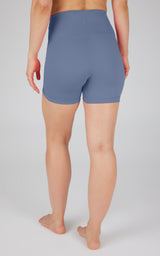 Women's high-waisted 5-inch bike shorts in solid muted blue from the Lux collection.
